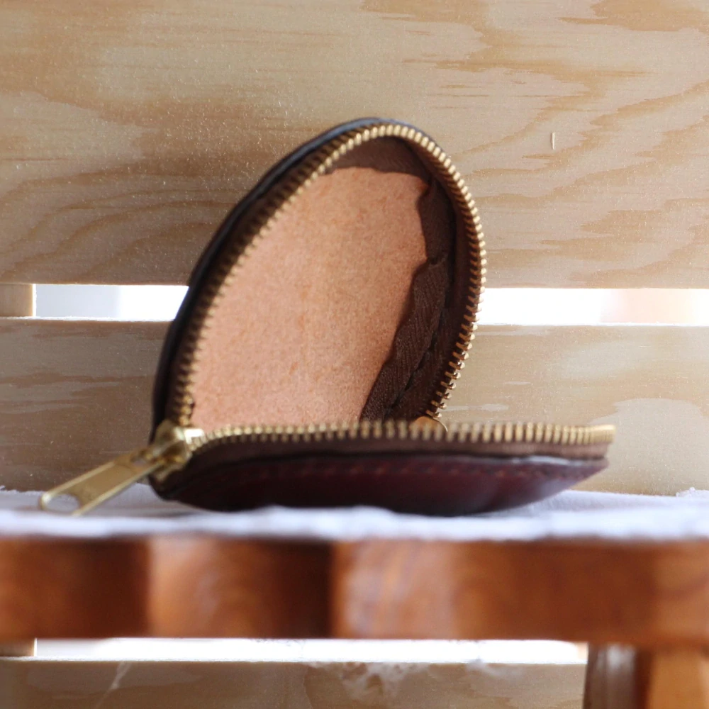 Kožená peněženka kulatá hnědá